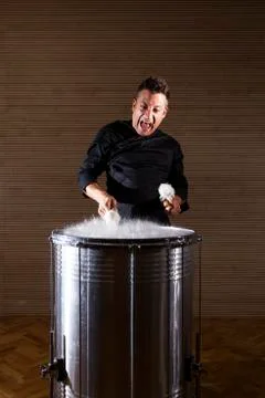 Percussionist practicing with two drums Stock Photos