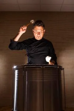 Percussionist practicing with two drums Stock Photos