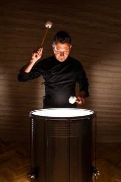 Percussionist practicing with two drums Stock Photos