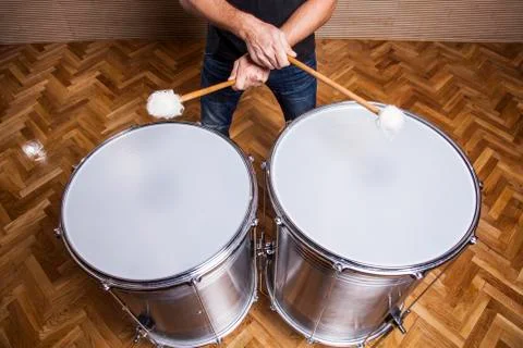 Percussionist practicing with two drums Stock Photos