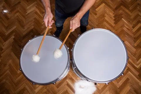 Percussionist practicing with two drums Stock Photos