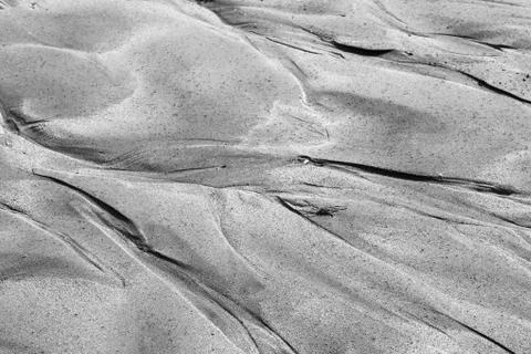 Perfect abstract pattern of sea sand formed after the tide 스톡 사진