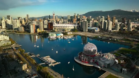 Perfect angle of Science World, B.C. Place and downtown Vancouver Canada Stock Footage 239073097