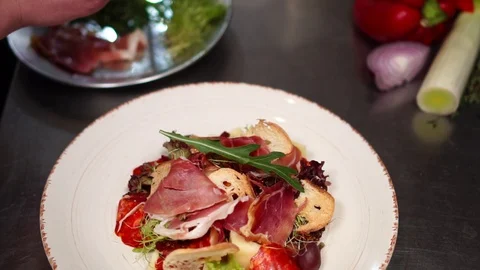 Perfect arrangement presentation of healthy vegetable Caesar salad on white Stock Footage 106977614