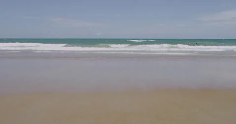 A perfect beach and ocean waves rolling into sandy shore Stock Footage 150640360
