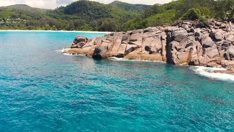 Perfect beach and rocks at coastline on Seychelles Stock Footage 87043719