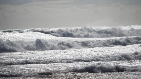 Perfect blue ocean wave breaks on the shore in australia Stock Footage 294654437