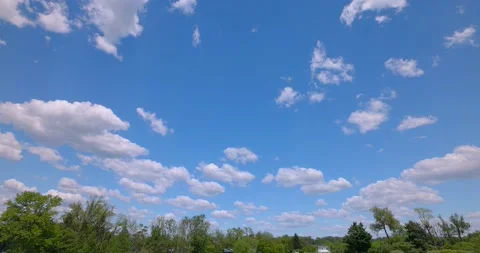 Perfect Blue Sky with Puffy White Clouds Colored and Saturated 4k Plate 16mm Видео 154272673