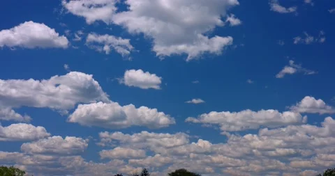 Perfect Blue Sky with Puffy White Clouds Colored and Saturated 4k Plate 24mm 스톡 동영상 154272731