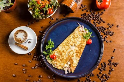 Perfect Breakfast Tapioca Toasted Cheese on a blue plate with Coffee Cinnamon an Stock Photos