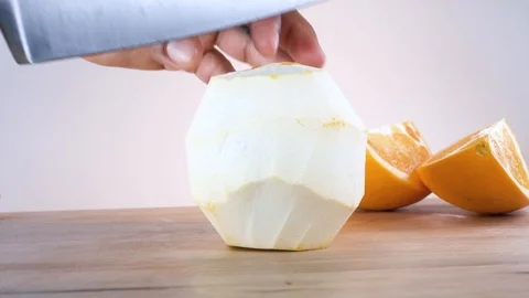 Perfect close up orange ready to slice in half 4k Stock Footage 124444852