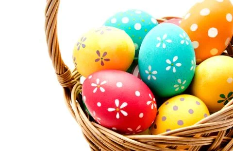 Perfect colorful handmade easter eggs in the basket isolated Stock Photos