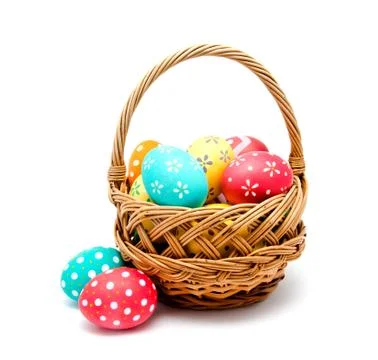 Perfect colorful handmade easter eggs in the basket isolated Stock Photos