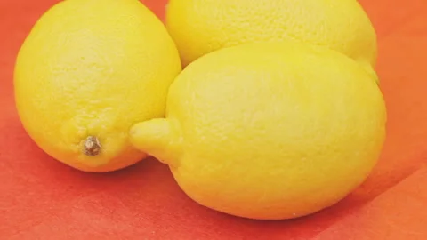 Perfect Composition With Lemons On Red Video stock 103181080