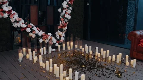 The perfect corner of love, inside, decorated with candles, shiny petals and a Stock Footage 155242590