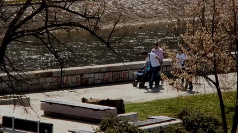 A perfect day for a walk by the river Stockbeeldmateriaal 37772173