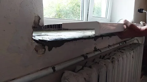 Perfect Fit: Expert Plastic Window Sill Installation Stock-Footage 311229041