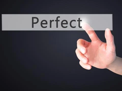 Perfect - Hand pressing a button on blurred background concept . Business, te Stock Photos