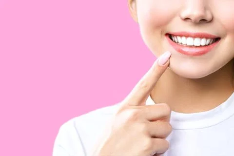 Perfect healthy teeth smile of a young woman. Teeth whitening. Dental clinic Stock Photos