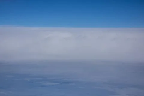 A perfect horizon between clouds and clear skies Stock Photos