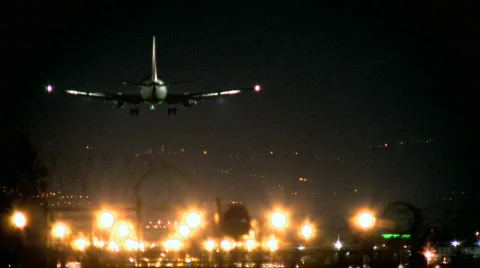 Perfect Landing of a jet plane - night time 2 Stock Footage