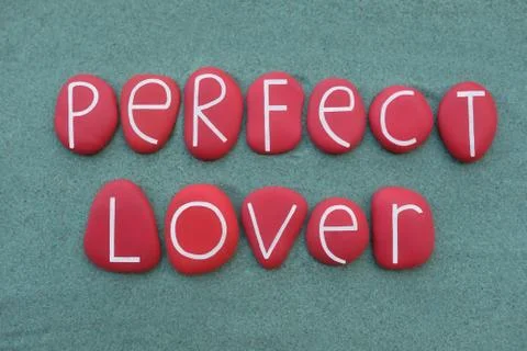 Perfect lover, creative phrase composed with red colored stone letters Stock Photos