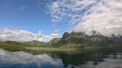 Perfect mirror reflection of dramatic green mountains in calm fjord Lofoten Stock-Footage 344453448