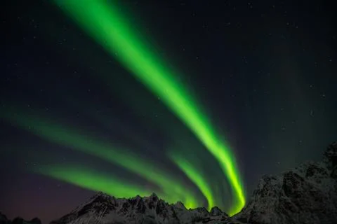 Perfect northern lights behind mountains in Norway Stock Photos