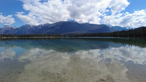 Perfect reflection of mountains in clear water Edith Lake Stock-Footage 159022405