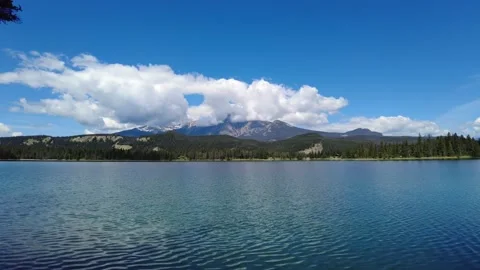 Perfect reflection of mountains in clear water Edith Lake Stock-Footage 159022514