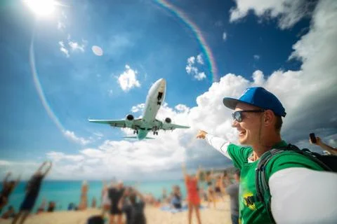 Perfect selfie with beach and airplane on background. Maho beach. Traveling Stock Photos