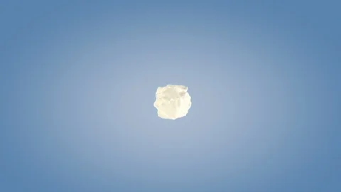 Perfect shape milk splashing isolated on blue background. Stock Footage 117234023