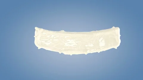 Perfect shape milk splashing isolated on blue background. Video stock 117235380