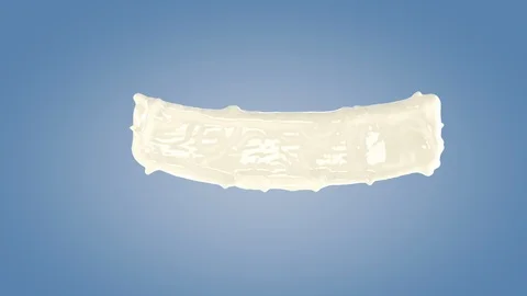 Perfect shape milk splashing isolated on blue background. Video stock 117236055