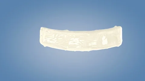 Perfect shape milk splashing isolated on blue background. Video stock 117237213