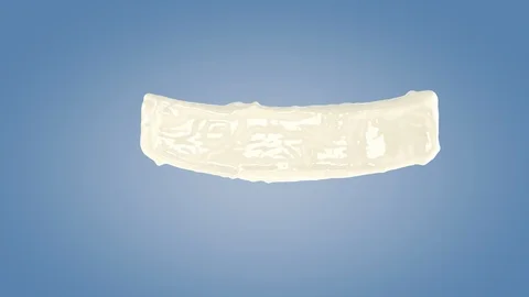 Perfect shape milk splashing isolated on blue background. Video stock 117237560