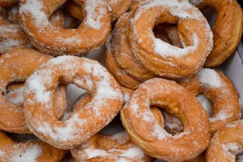 Perfect soft fresh ring donuts with sugar closeup Stock-Fotos