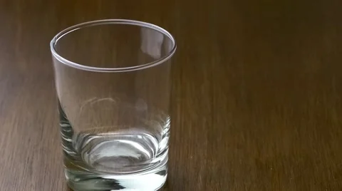 Perfect stream of delicious plant based milk dropping down to fill up a glass Stock Footage 61531514