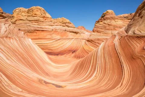 Perfect sunlight coverage of The Wave in North Coyote Butte, Arizona. Stock Photos