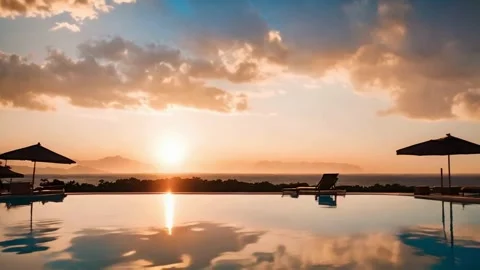 Perfect Sunset Over Infinity Pool With Umbrella Slow Motion Tracking Video stock 273996683