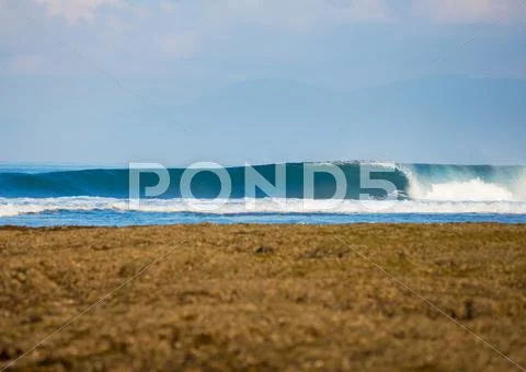 Perfect surfing wave Stock Photos