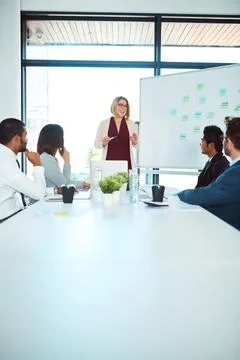 The perfect time to put your ideas out there. corporate businesspeople having a Stock Photos