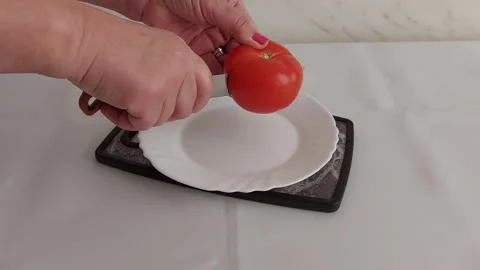 Perfect Tomato Cutting: Tips for Even Slices Stock Footage 304045391