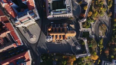 A perfect top-down aerial of Matthias Church reveals its patterned roof Stock Footage 320232332