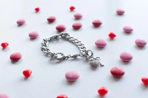 The perfect valentines gift for her a shiny bracelet with chocolate Stock Photos