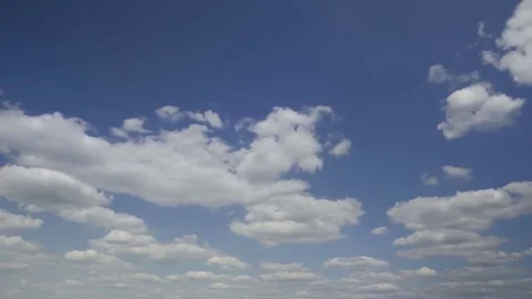 Perfect white clouds in a beautiful blue sky, meditative relaxing, time lapse Stock Footage 78708661