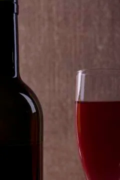 Perfect wine bottle and glass silhouette on cloth background Stock Photos