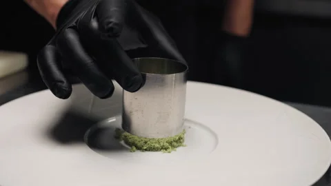 Perfectioning the shape of a meal garnish Stock Footage 269082975
