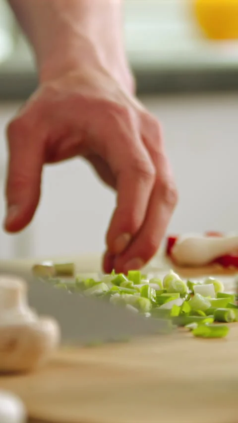 Perfectly arranging fresh onions in the kitchen for a delicious meal Stock Footage 341762224
