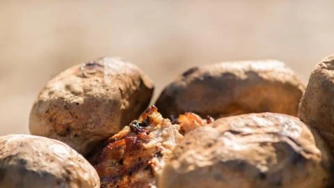 Perfectly cooked barbecue potatoes and steak Stock Photos